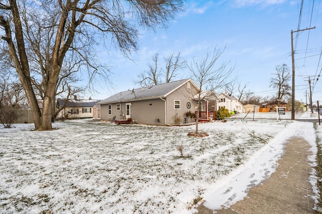 view of snow covered house