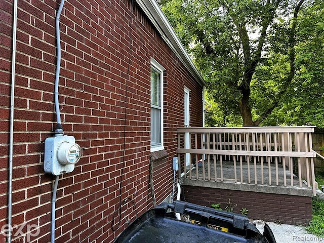 view of side of home featuring a deck