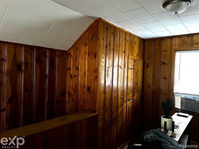 room details featuring wood walls