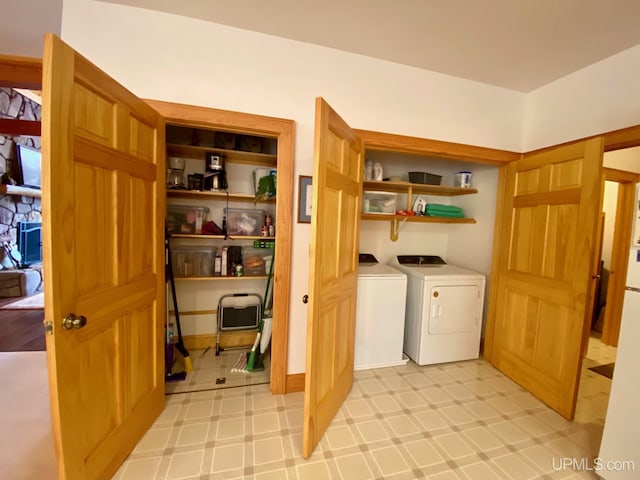 laundry room with washer and clothes dryer