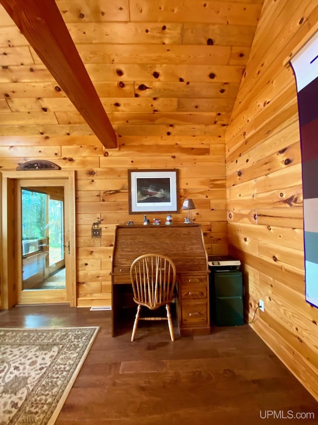 unfurnished office with wood ceiling, wooden walls, hardwood / wood-style floors, and lofted ceiling with beams