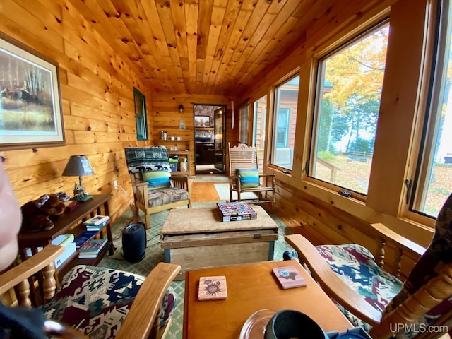 sunroom / solarium featuring wooden ceiling