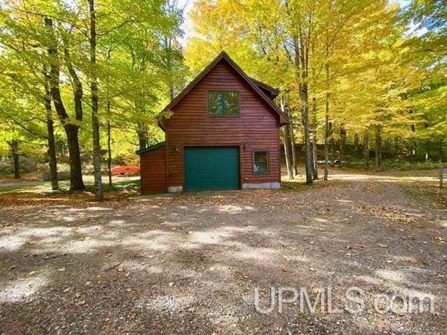 N10006 Shore Dr, Au Train, MI 49806 - wooden deck with a lawn and an outdoor living space