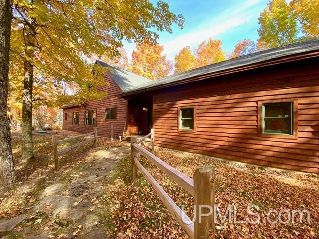 N10006 Shore Dr, Au Train, MI 49806 - rear view of property with a yard