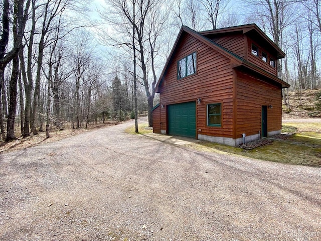 N10006 Shore Dr, Au Train, MI 49806 - view of side of property featuring a garage