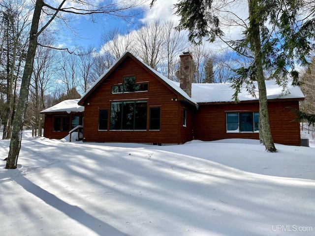 view of snow covered property