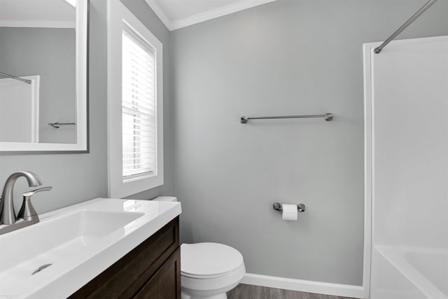 full bathroom with vanity, shower / tub combination, crown molding, hardwood / wood-style flooring, and toilet