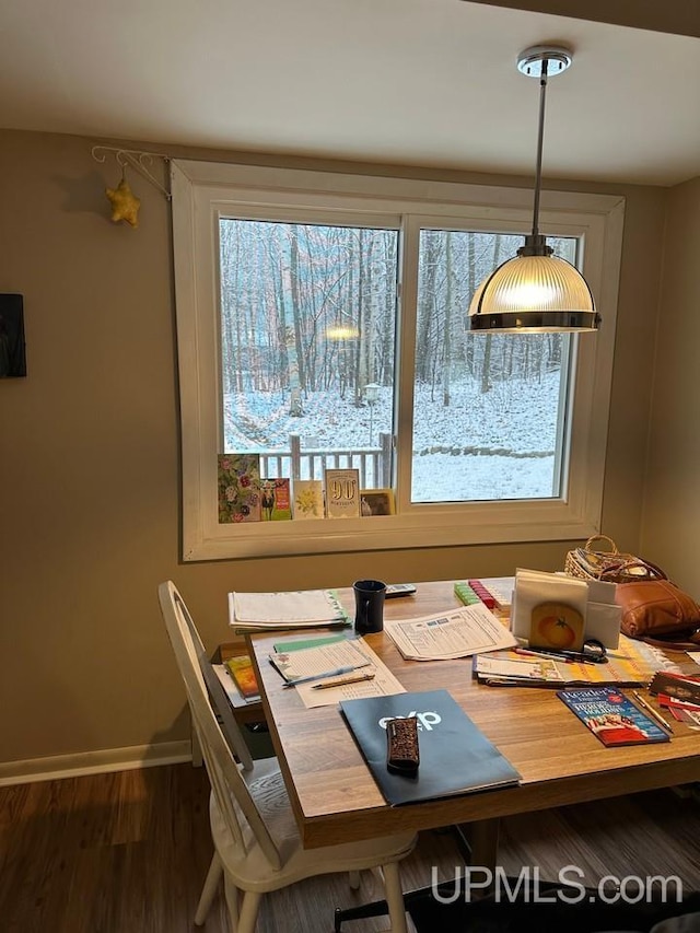 dining area featuring dark hardwood / wood-style flooring