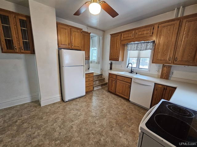 kitchen with ceiling fan, sink, and white appliances