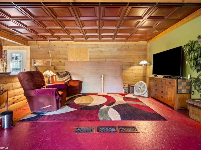 sitting room featuring wood walls