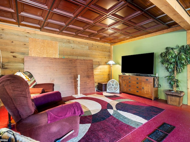 living room featuring carpet floors, coffered ceiling, and wood walls