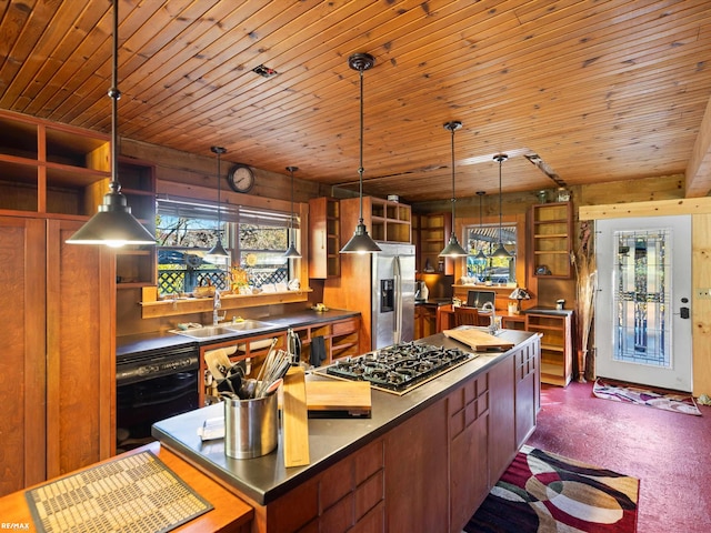 kitchen with plenty of natural light, wooden ceiling, and wood walls