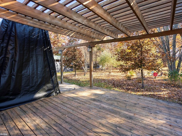 wooden deck with a pergola