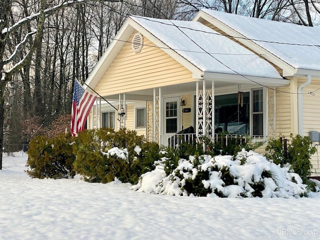 bungalow-style home featuring a porch