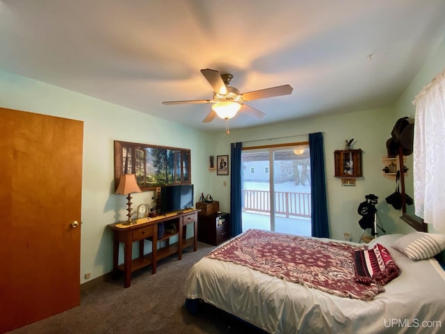 bedroom featuring access to outside, ceiling fan, and dark colored carpet