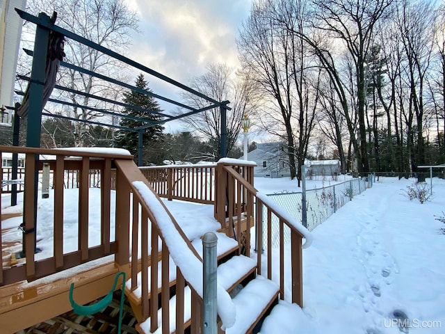 view of snow covered deck