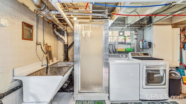 laundry area featuring washing machine and dryer