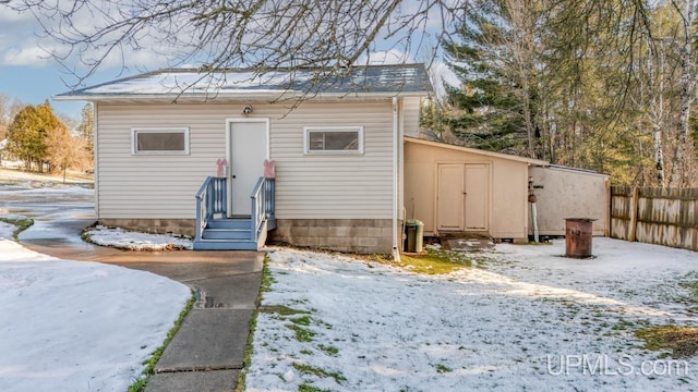 view of snow covered property