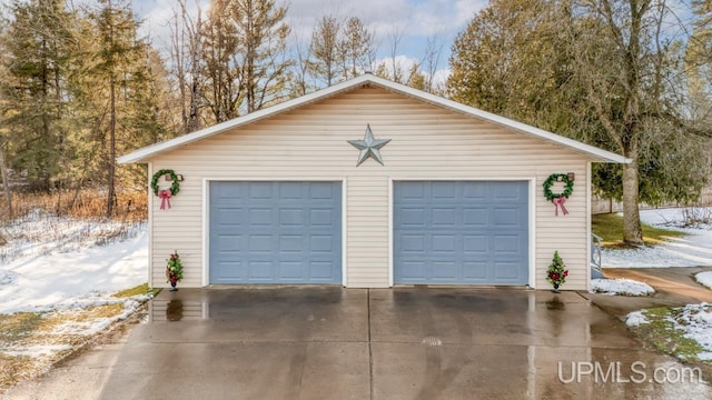 view of snow covered garage