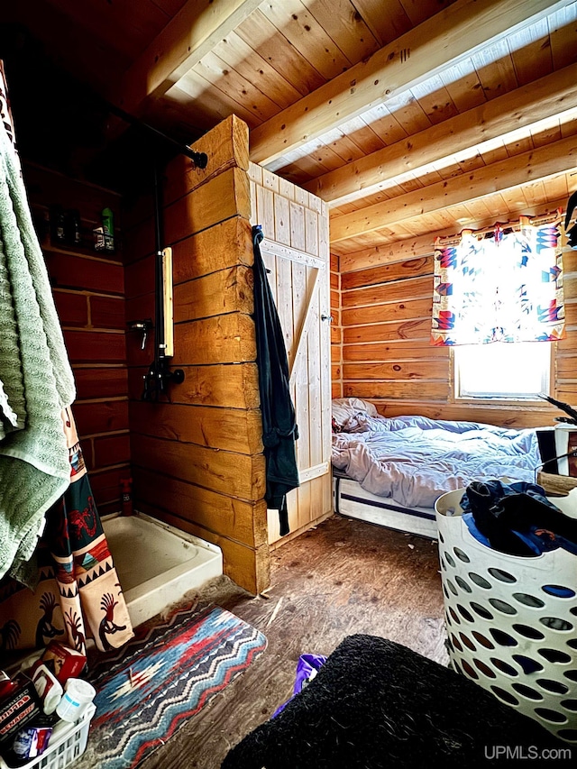 bedroom featuring beamed ceiling, wood-type flooring, wooden walls, and wooden ceiling