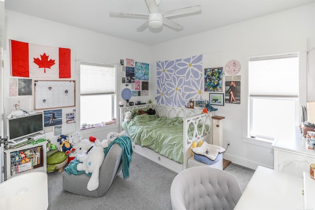 carpeted bedroom featuring ceiling fan