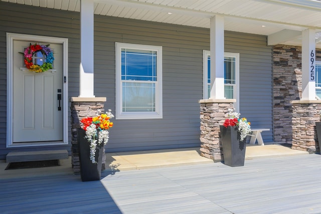 entrance to property with covered porch