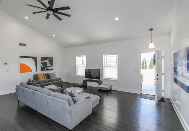 living room featuring ceiling fan, dark wood-type flooring, and high vaulted ceiling