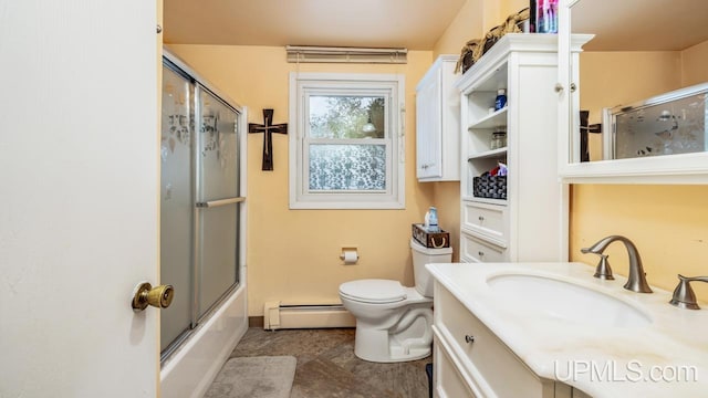 full bathroom with enclosed tub / shower combo, a baseboard heating unit, tile patterned floors, toilet, and vanity