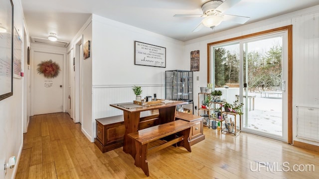 dining room featuring ceiling fan and light hardwood / wood-style flooring