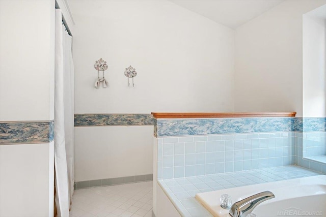 bathroom with tile patterned flooring