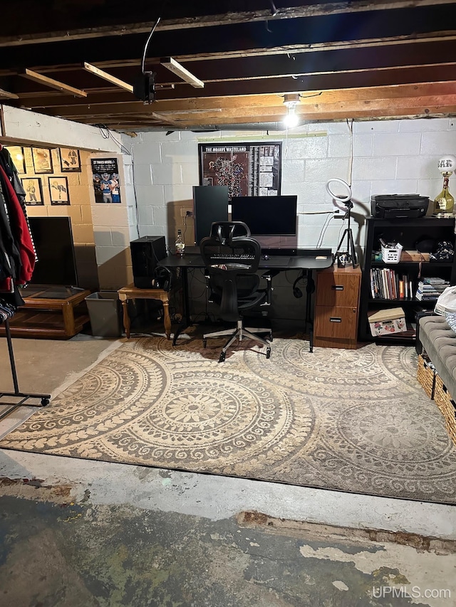 office area featuring concrete floors