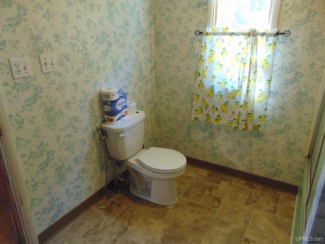 bathroom featuring toilet