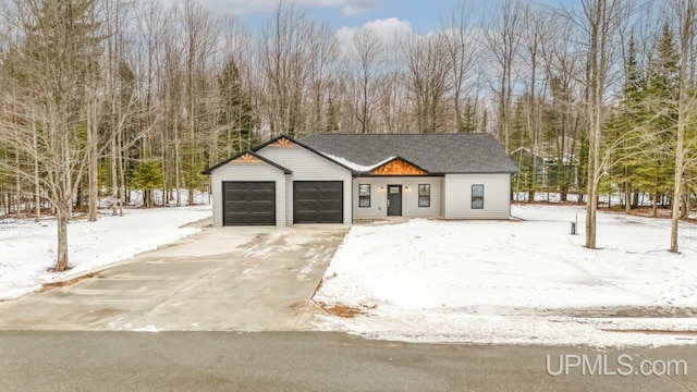 view of front of property featuring a garage