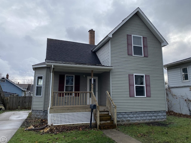 view of property featuring a porch