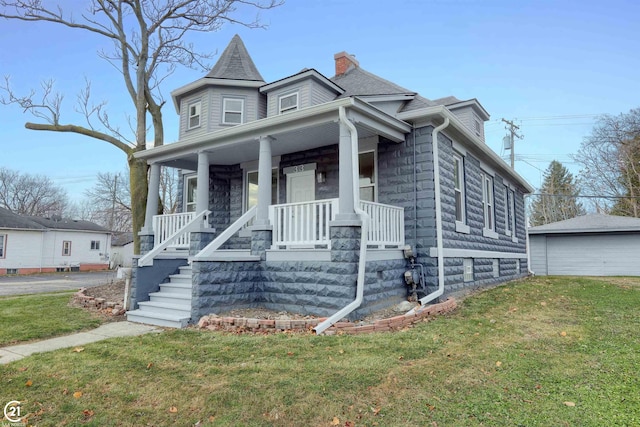 view of front of home featuring a porch and a front yard