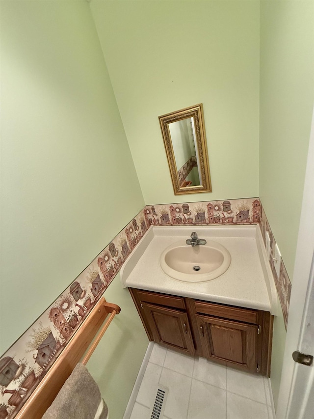 bathroom with vanity and tile patterned floors