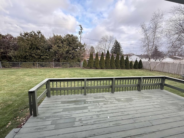 wooden terrace with a yard