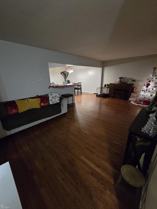 living room featuring dark wood-type flooring