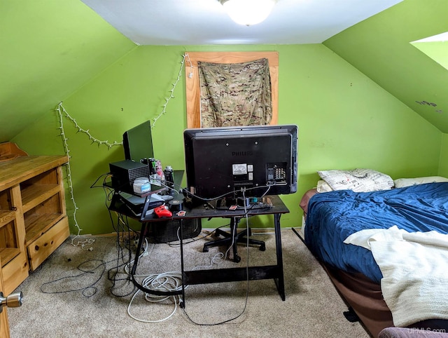 carpeted bedroom with vaulted ceiling