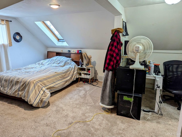 carpeted bedroom with vaulted ceiling