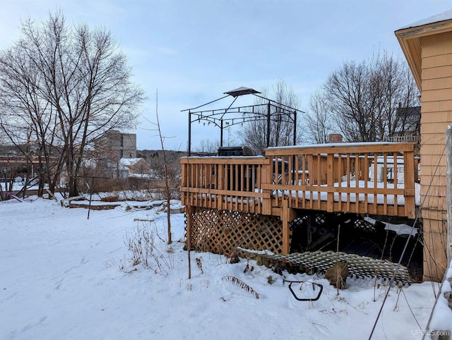 view of snow covered deck