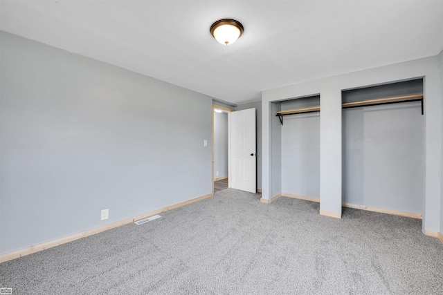 unfurnished bedroom with carpet flooring