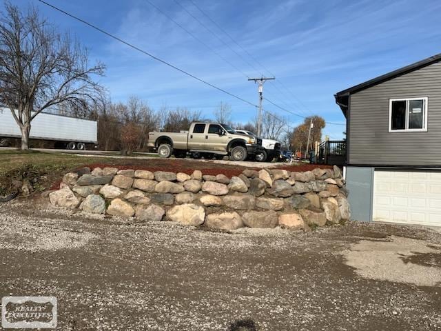 view of yard with a garage