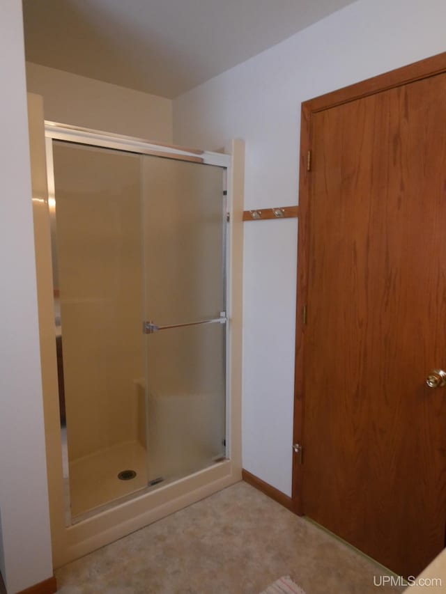 bathroom with an enclosed shower