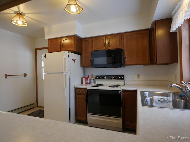 kitchen with white appliances, a baseboard heating unit, and sink