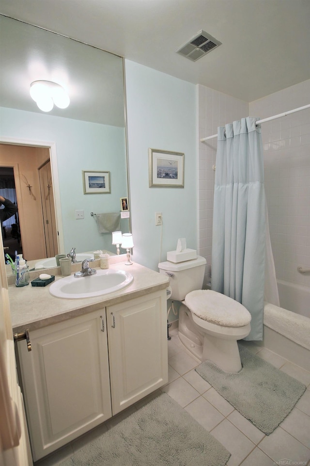 full bathroom featuring tile patterned flooring, shower / bath combination with curtain, vanity, and toilet