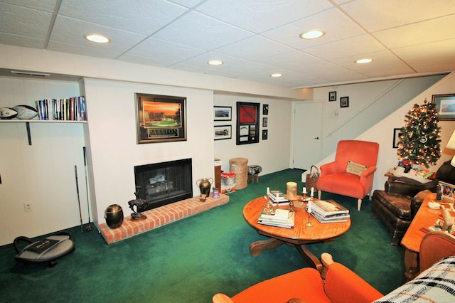 game room featuring carpet and a drop ceiling