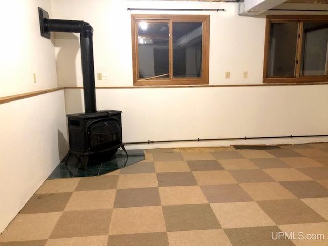 interior space featuring a wood stove