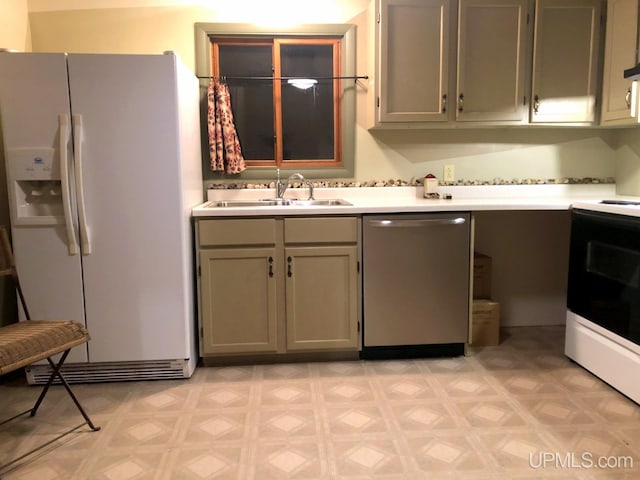 kitchen with white appliances and sink