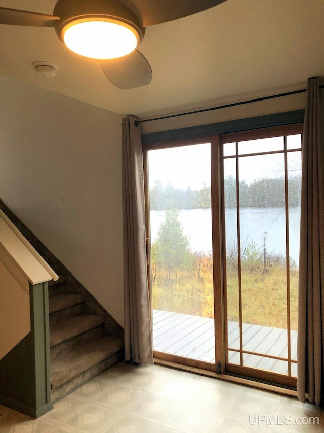 entryway featuring a water view